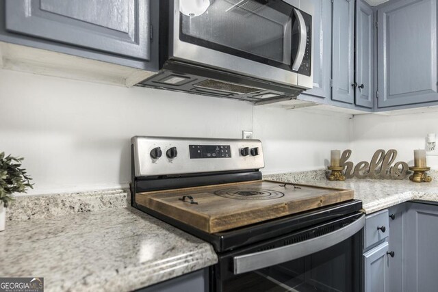 kitchen with appliances with stainless steel finishes