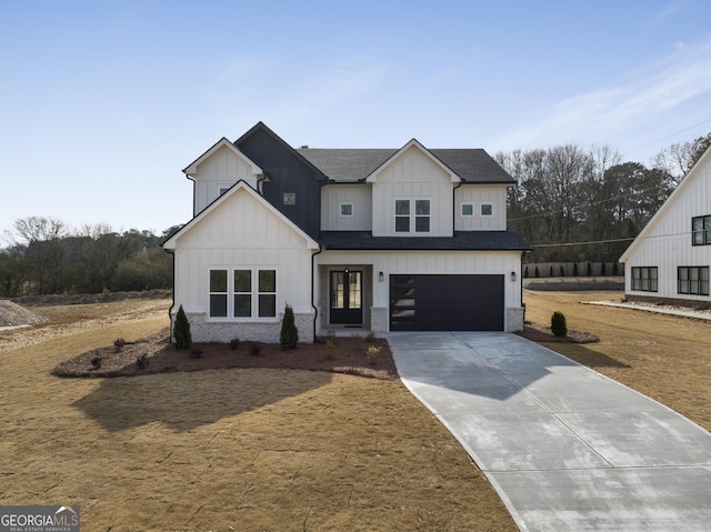 modern farmhouse style home featuring a garage