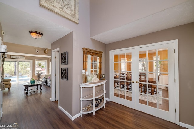 interior space with french doors and dark hardwood / wood-style floors