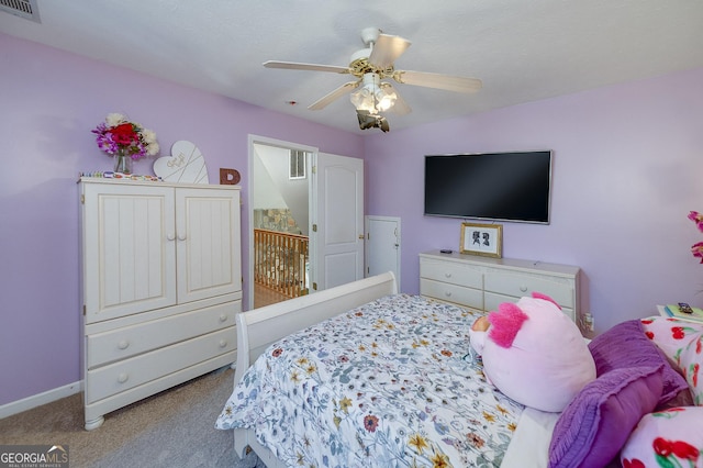 carpeted bedroom featuring ceiling fan