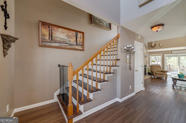 stairway featuring hardwood / wood-style flooring