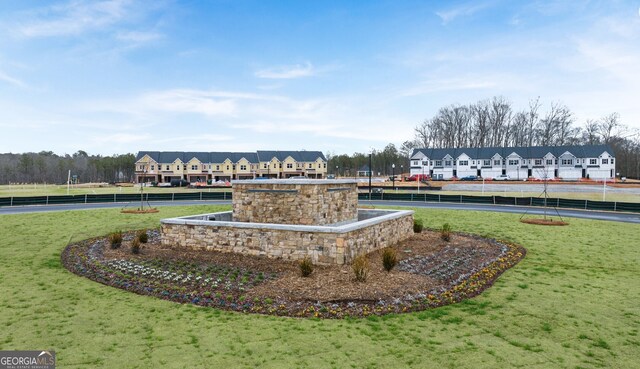 321 Sound Cir, Stockbridge, GA 30281 - view of home's community featuring a yard