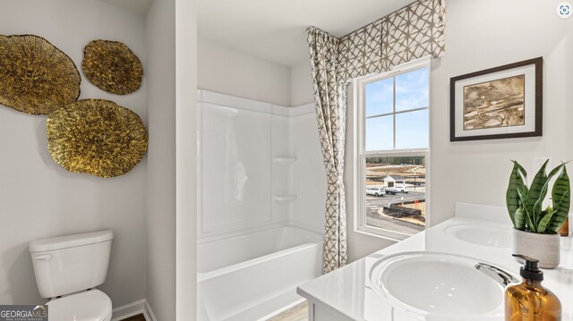 321 Sound Cir, Stockbridge, GA 30281 - full bathroom featuring vanity, bathing tub / shower combination, and toilet
