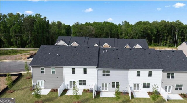 321 Sound Cir, Stockbridge, GA 30281 - birds eye view of property featuring a patio area and a yard
