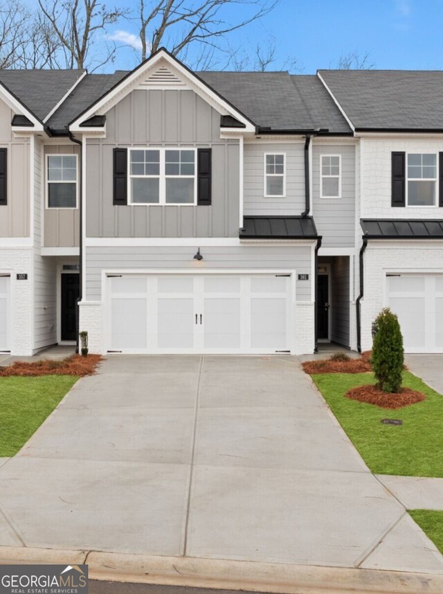 321 Sound Cir, Stockbridge, GA 30281 - townhome / multi-family property with a garage