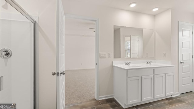 321 Sound Cir, Stockbridge, GA 30281 - bathroom featuring vanity and a shower