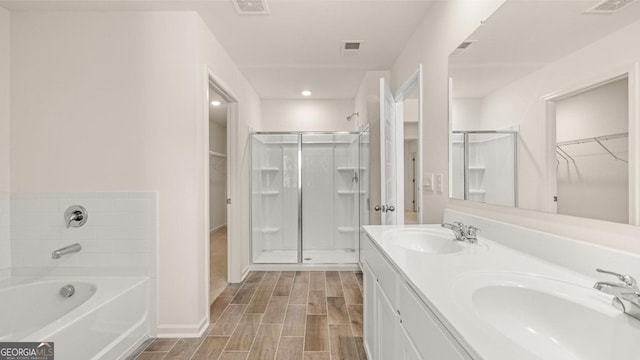 321 Sound Cir, Stockbridge, GA 30281 - bathroom with separate shower and tub and vanity