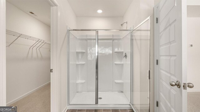 321 Sound Cir, Stockbridge, GA 30281 - bathroom featuring walk in shower