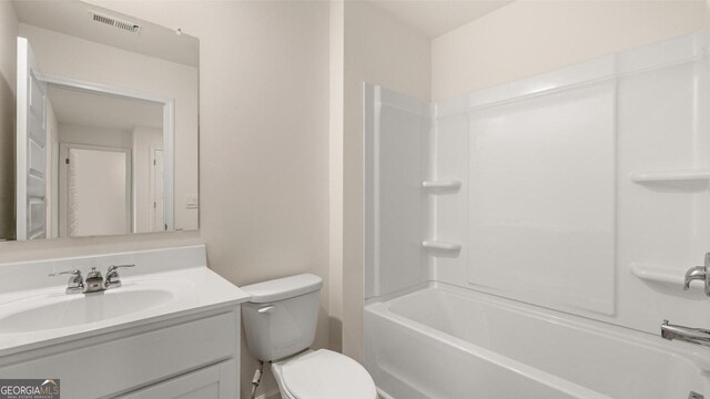 321 Sound Cir, Stockbridge, GA 30281 - full bathroom with bathing tub / shower combination, vanity, and toilet