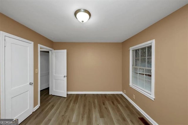 unfurnished bedroom with light hardwood / wood-style flooring