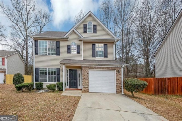 front of property featuring a garage