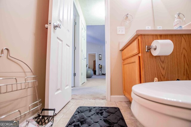 carpeted bedroom with a textured ceiling