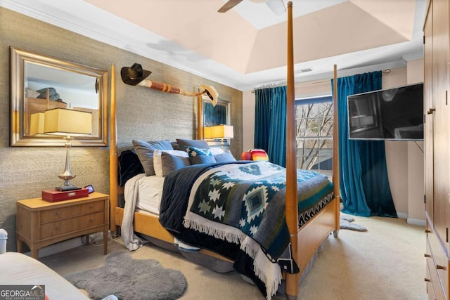 bedroom featuring ornamental molding, a raised ceiling, vaulted ceiling, and light carpet