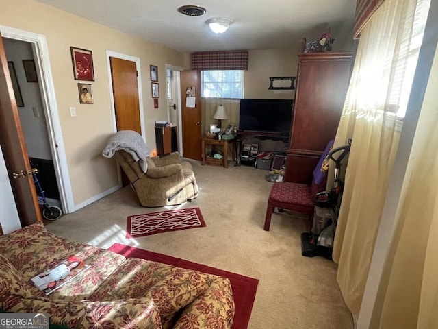 living room with light colored carpet