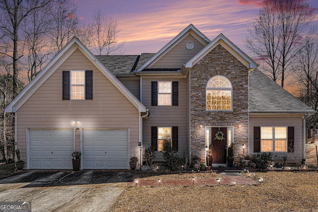 view of front of house with a garage