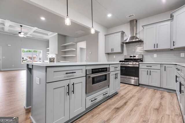 8981 Callaway Lot 87Silva, Winston, GA 30187 - kitchen with gray cabinets, appliances with stainless steel finishes, tasteful backsplash, wall chimney exhaust hood, and light wood-style flooring