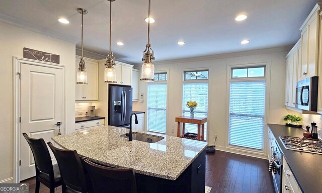 interior space featuring ornamental molding and hardwood / wood-style floors