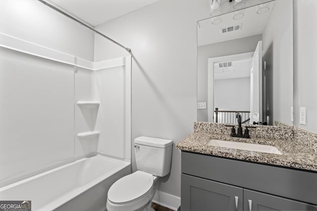 full bathroom featuring vanity, toilet, and bathing tub / shower combination