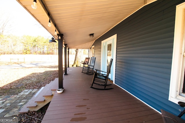 wooden terrace with covered porch