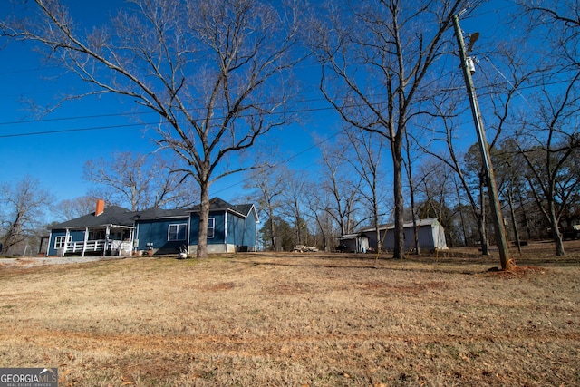 exterior space with a shed