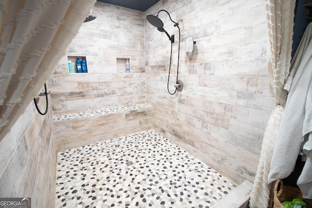 bathroom with walk in shower