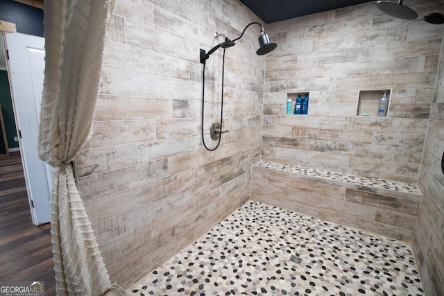 bathroom with a shower with shower curtain