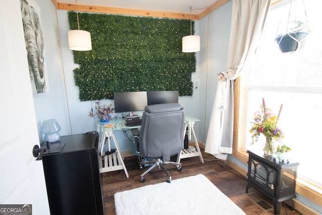 home office featuring a healthy amount of sunlight and dark wood-type flooring