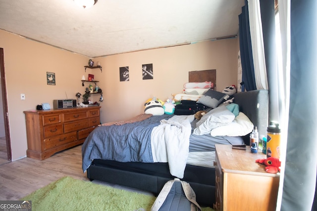 bedroom featuring light wood-type flooring