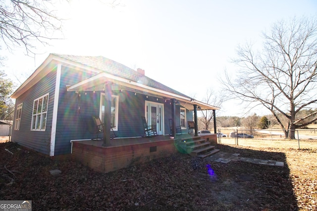 view of home's exterior with covered porch