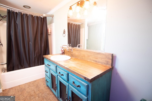 bathroom with vanity, ornamental molding, and shower / tub combo with curtain