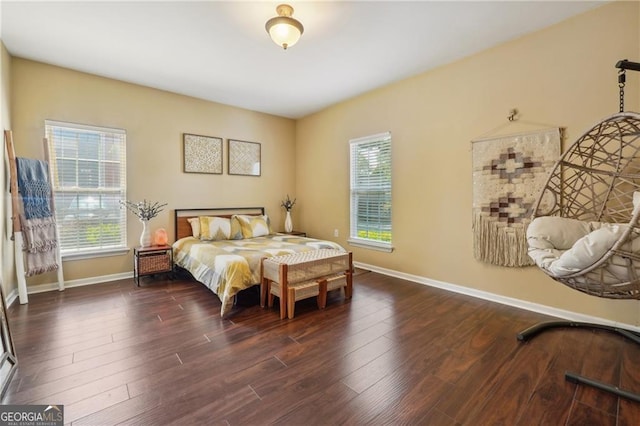 bedroom featuring dark wood-type flooring