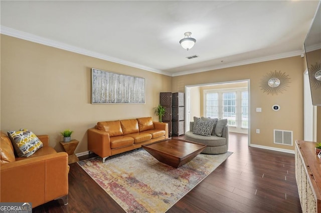 living room with ornamental molding and dark hardwood / wood-style floors