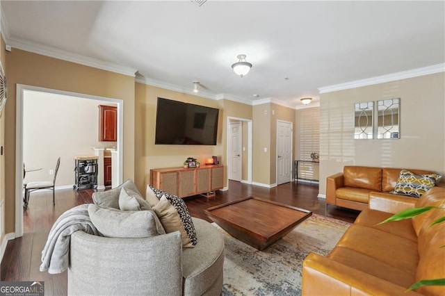 living room with dark wood-type flooring and ornamental molding