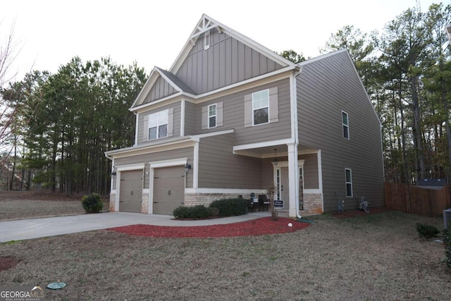 craftsman house with a garage