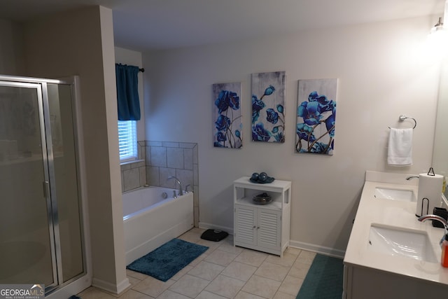 bathroom with vanity, tile patterned floors, and separate shower and tub