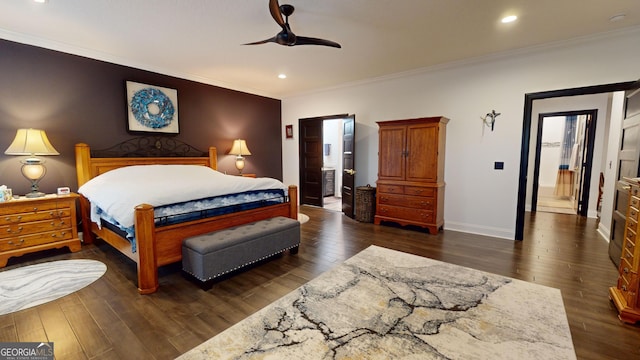 bedroom featuring crown molding, dark wood-type flooring, and ceiling fan