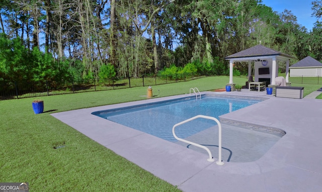 view of pool featuring a gazebo, a patio area, exterior fireplace, and a lawn