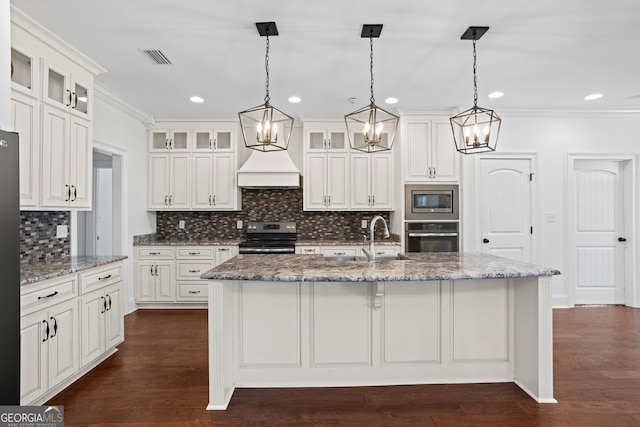 kitchen featuring white cabinetry, crown molding, and appliances with stainless steel finishes