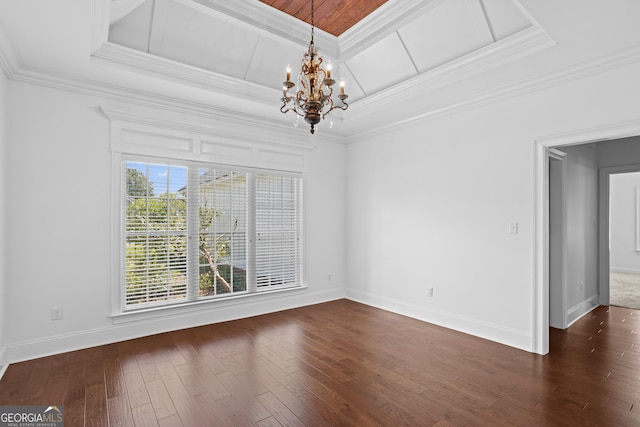 interior space with baseboards, coffered ceiling, dark wood finished floors, crown molding, and a chandelier