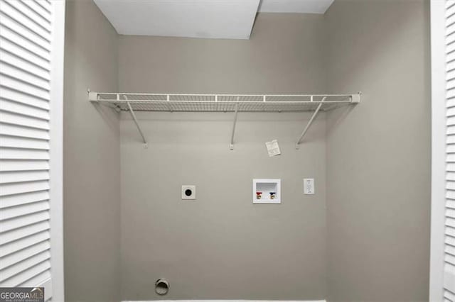 clothes washing area with hookup for a washing machine and hookup for an electric dryer