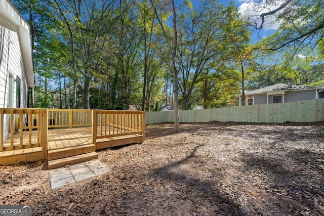 view of yard with a deck