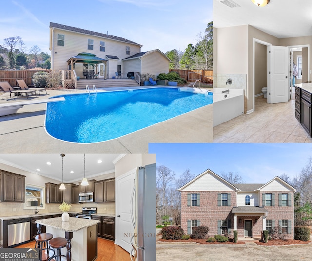 view of pool featuring a fenced in pool, a gazebo, an outdoor kitchen, fence, and a diving board