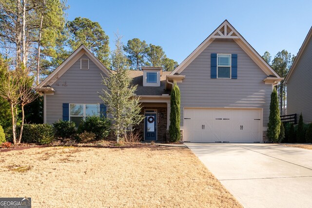 view of front facade featuring driveway and a garage