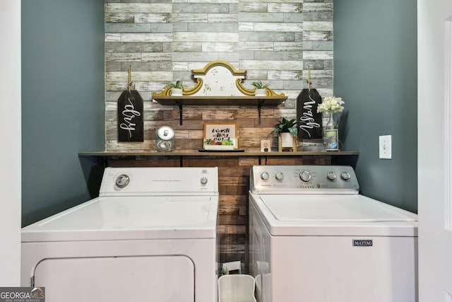 laundry area featuring separate washer and dryer