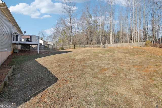 view of yard featuring a wooden deck