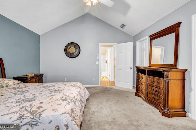 bedroom featuring carpet, lofted ceiling, and ceiling fan