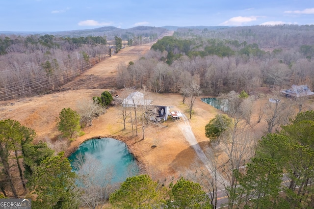 bird's eye view with a water and mountain view