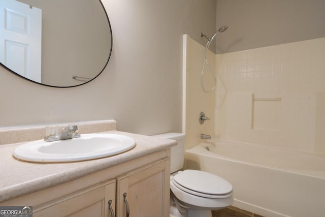 full bathroom with  shower combination, toilet, and vanity