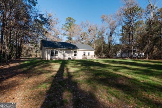 exterior space with a yard