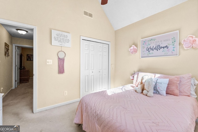 bedroom with high vaulted ceiling, light carpet, ceiling fan, and a closet